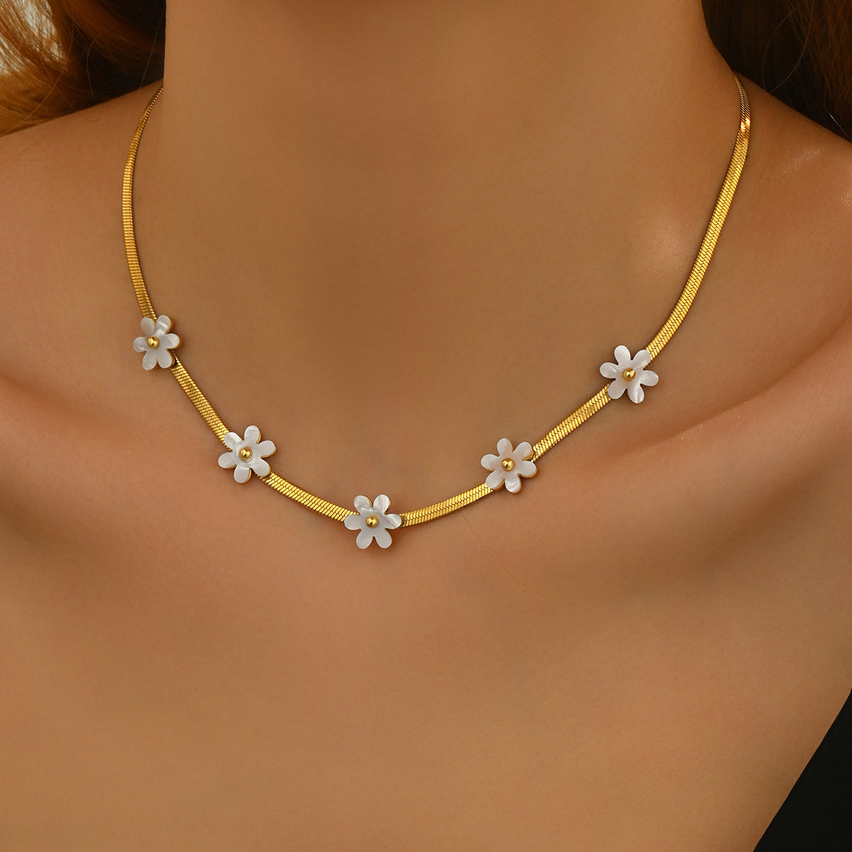 Lxalry 18K Gold-Plated Bohemian Floral Necklace features delicate white blossom charms on hypoallergenic stainless steel. Skin-safe, tarnish-free jewelry for women/wife/mom – perfect for festive occasions & everyday boho elegance